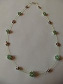 Collier fleuri vert